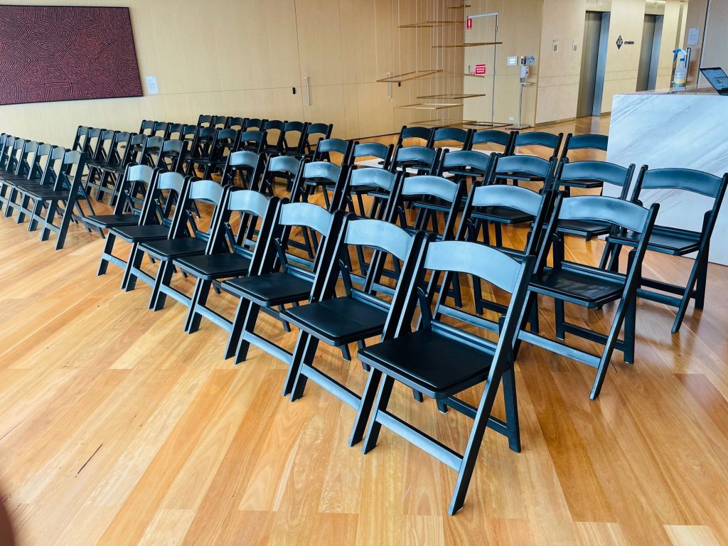 black padded folding chairs
