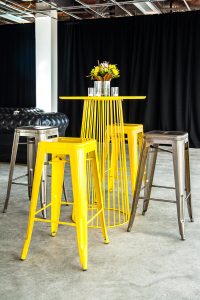Yellow Bar Table with yellow and silver stools